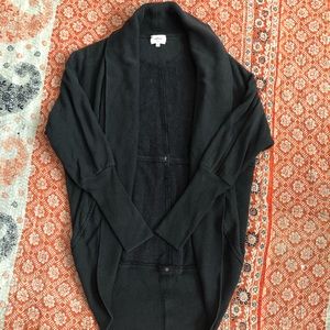 Wilfred black circle sweatshirt.